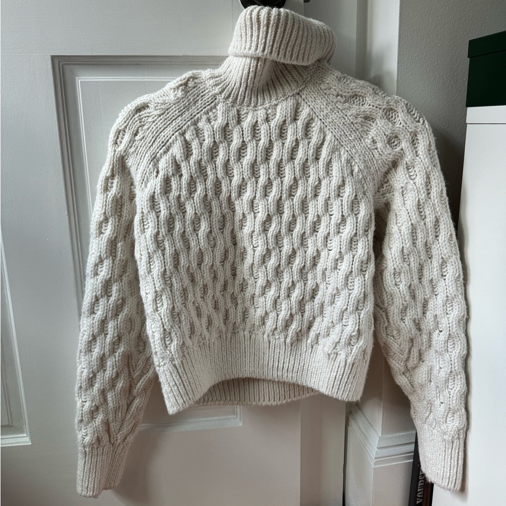 White chunky cable knit turtleneck
